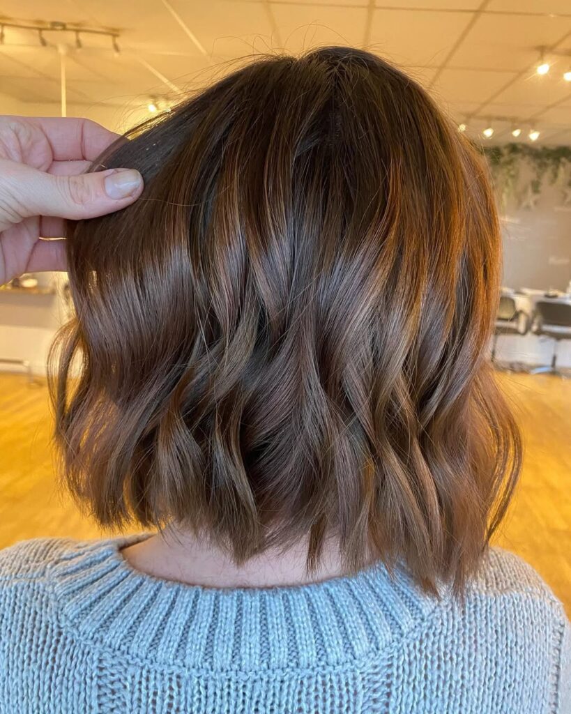 The Sleek Brunette Bob with a Middle Part