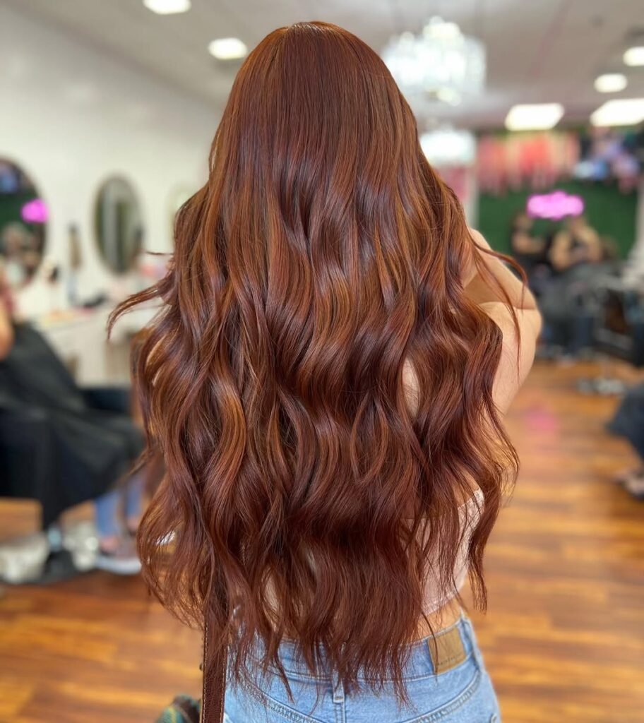 13 Auburn Hair Color Ideas That Will Make You Want to Book a Salon Appointment Immediately 8 Auburn with Caramel Highlights