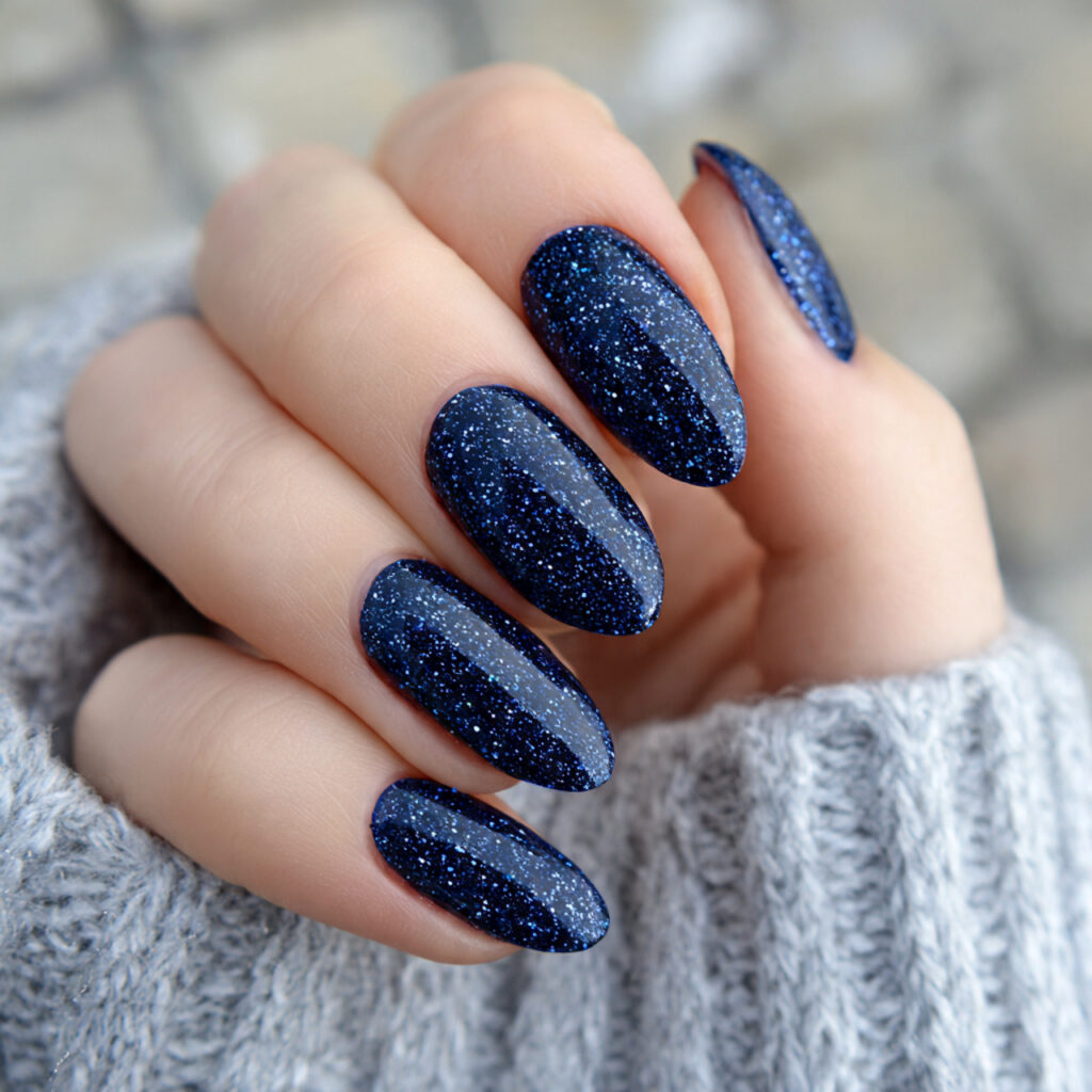15 Dark Blue Nail Ideas That Look Expensive (But Are Totally Wearable Tomorrow) 9 Navy Blue Glitter Nails