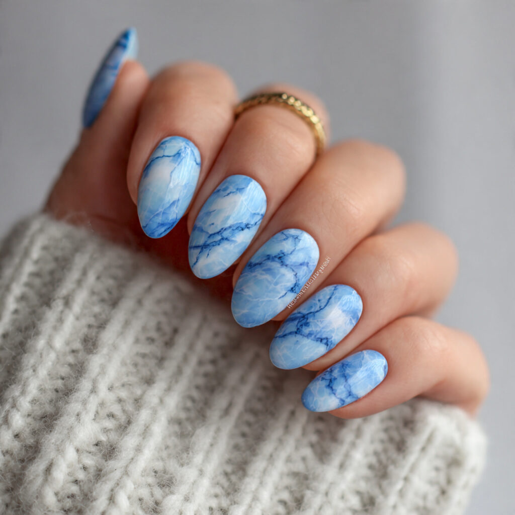 14 Baby Blue Nails Ideas That Are Soft, Chic, and Seriously Addictive 10 baby blue marble nails