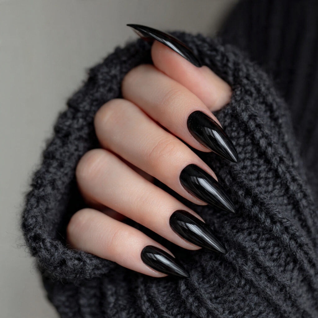 15 Almond Acrylic Nails That Instantly Elevate Your Style (And the Outfits That Look Amazing With Them) 5 black almond acrylic nails all black outfit