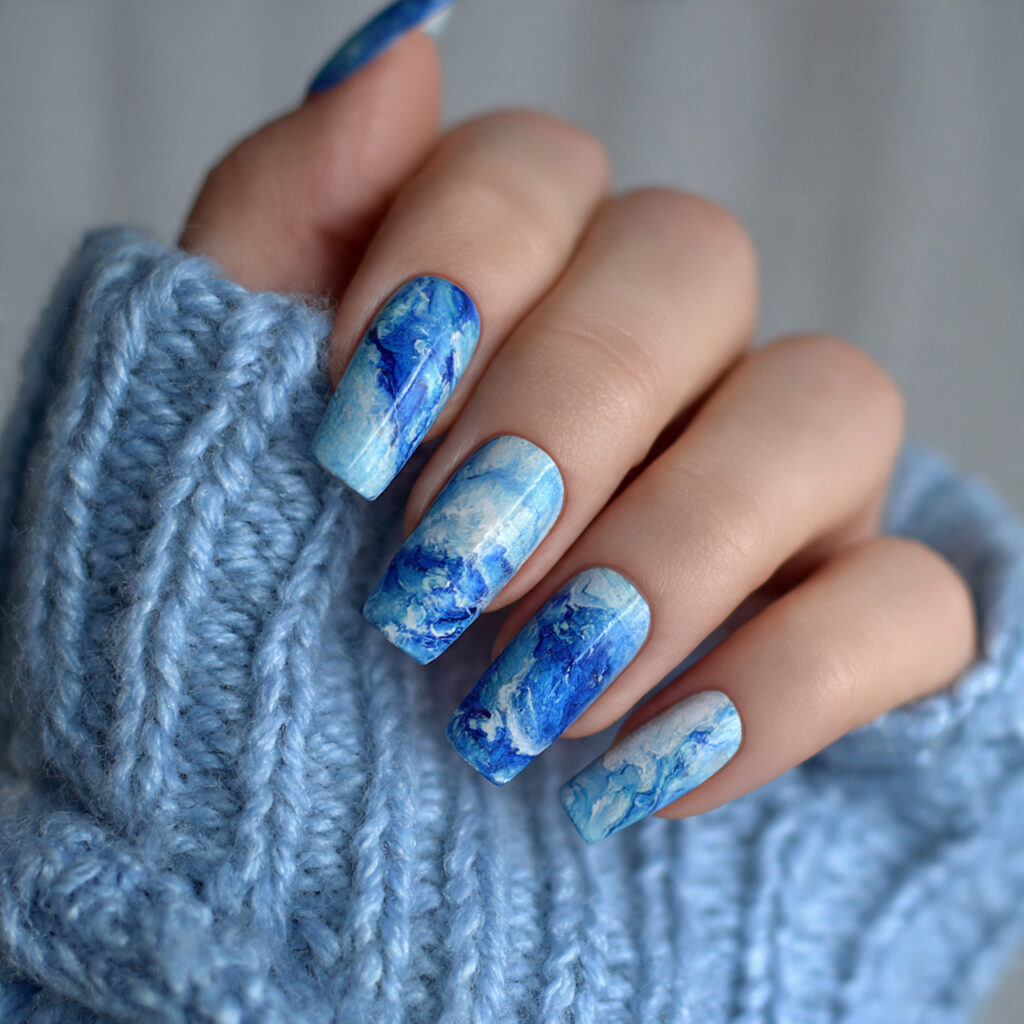 14 Trending Blue Nail Ideas Everyone Is Obsessed With Right Now (Your Next Mani Just Found You) 13 blue marble nails