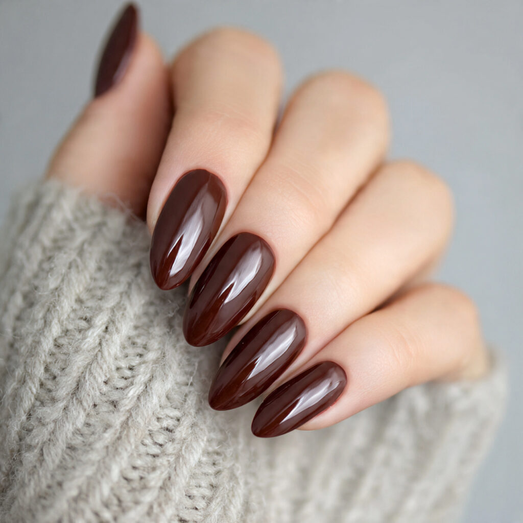 14 Short Oval Nails That Are Cute, Chic, and Seriously Easy to Wear Right Now 11 chocolate brown short oval nails