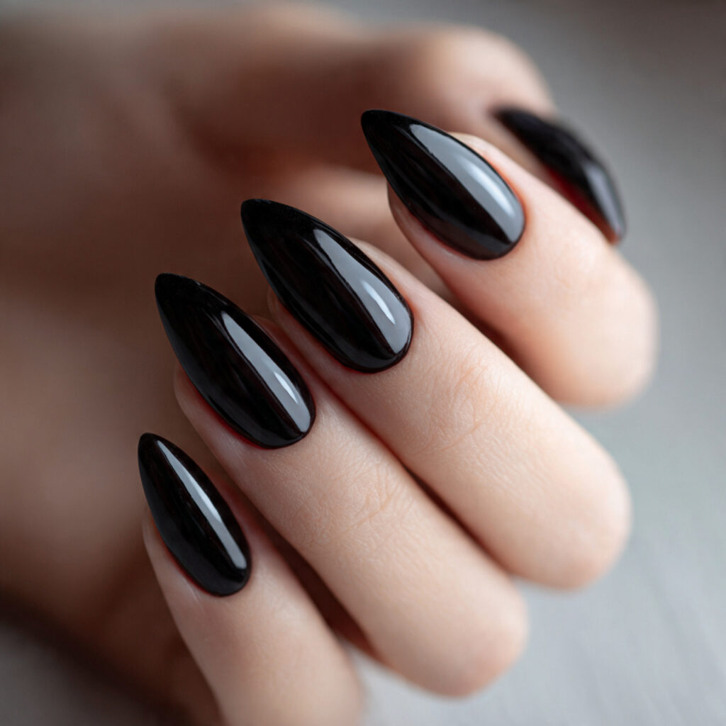 glossy black short almond nails