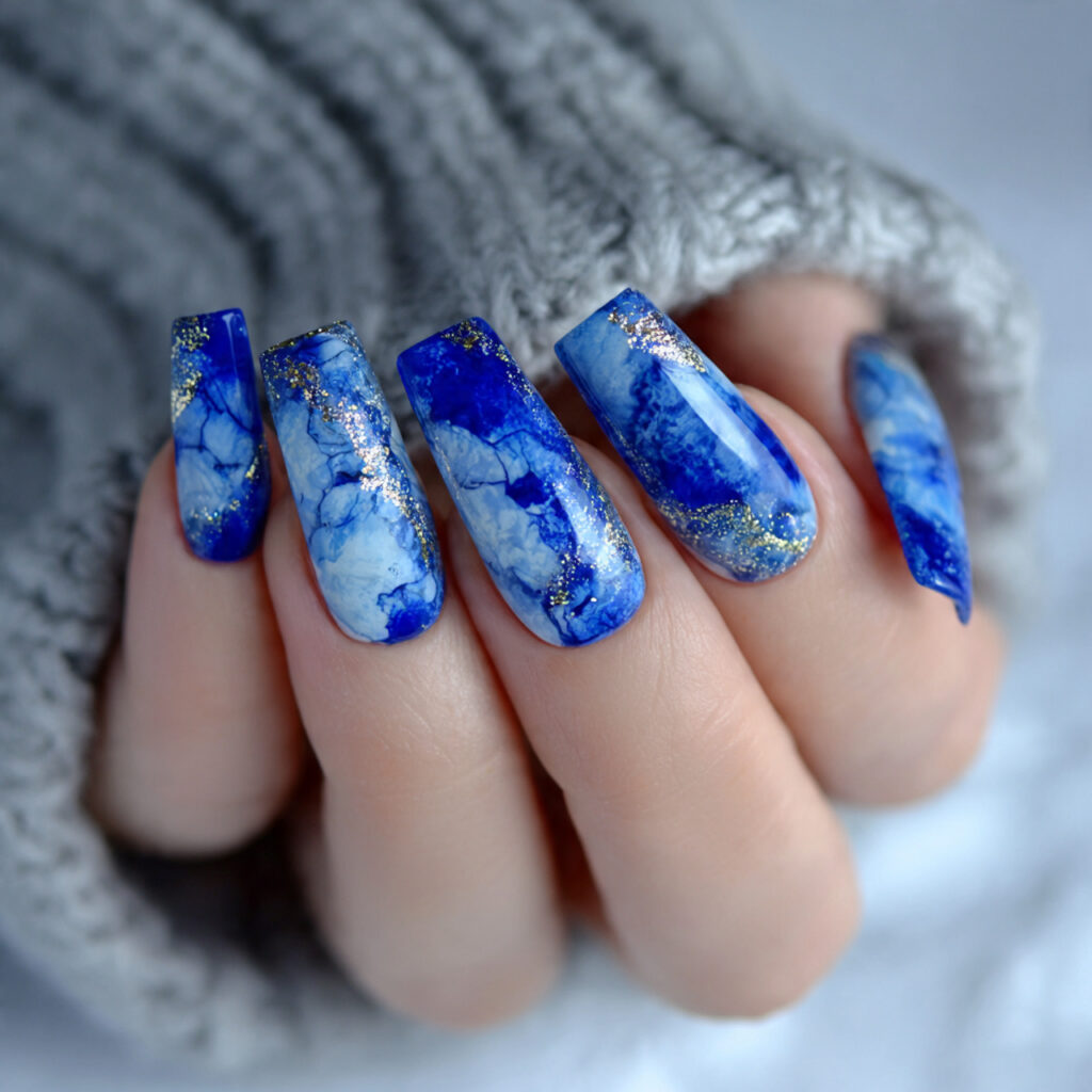 15 Royal Blue Nails That Instantly Elevate Your Style (And Yes, You Can Totally Wear Them Tomorrow) 12 royal blue marble nails
