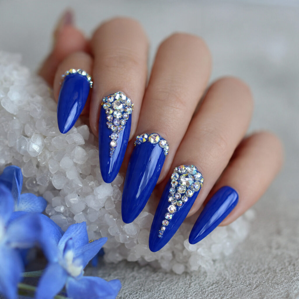 15 Royal Blue Nails That Instantly Elevate Your Style (And Yes, You Can Totally Wear Them Tomorrow) 16 royal blue nails with rhinestones