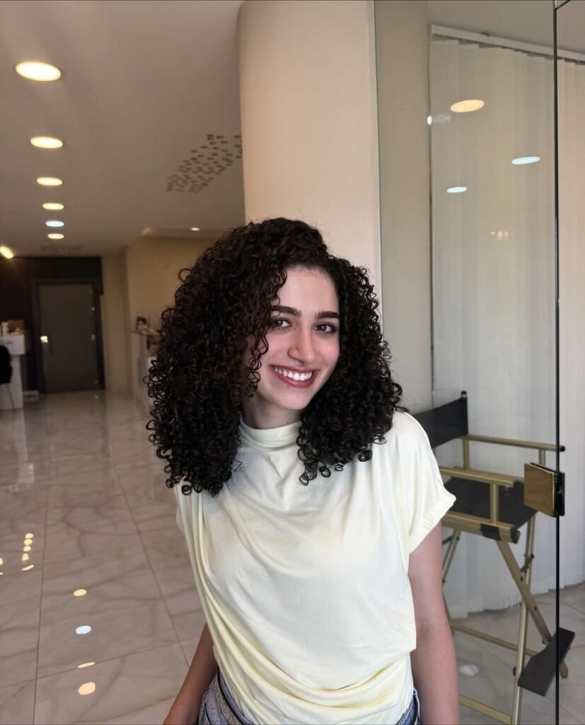 17 Stylish Toddler Hairstyles That Will Make You Want to Try Them Too 3 Bouncy Curls with a Side Part