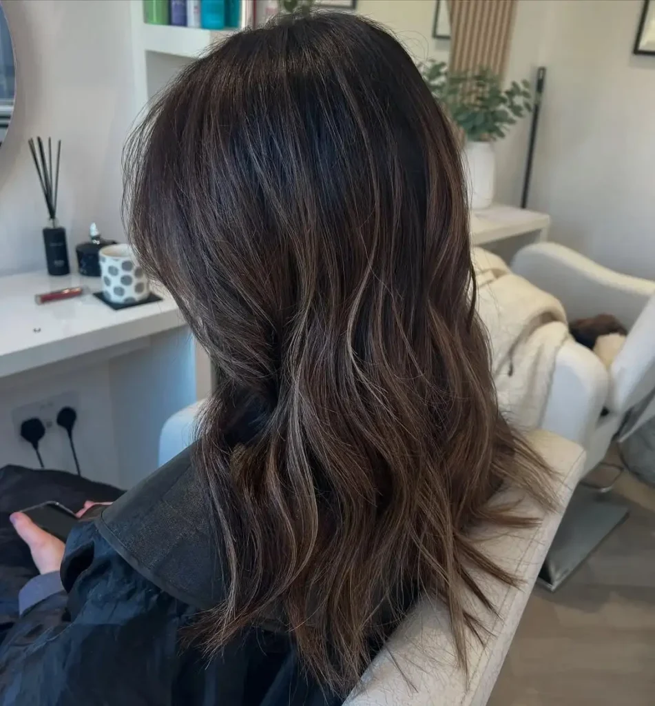 16 Cool Hair Color Ideas That Instantly Make Your Look Feel Expensive, Fun, and Very Main Character 14 Charcoal Brunette