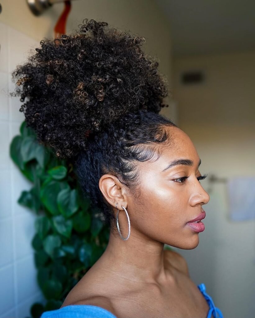 17 Adorable Toddler Hairstyles Idea That'll Make You Actually Look Forward to Hair Time 14 Curly Puff with a Bow