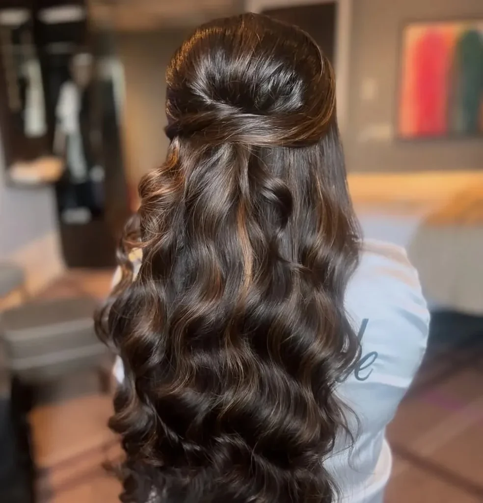 15 Concert Hairstyle Ideas That Look Cute, Last All Night, and Survive the Encore 4 Half Up Half Down Waves