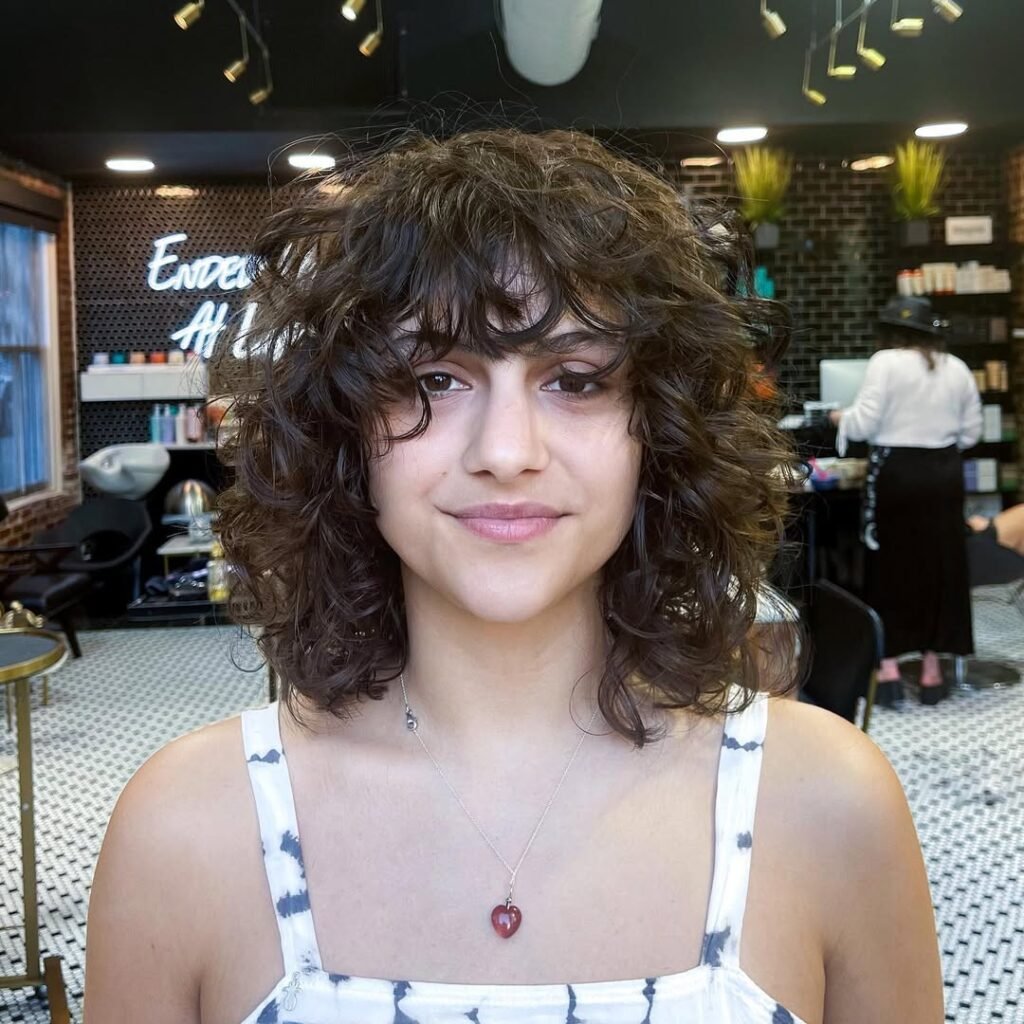 15 Short Hair Wolf Cut Styles That Will Make You Want to Chop It All Off (Trust Me, It’s Worth It) 4 Layered Shaggy Bob with Tousled Ends