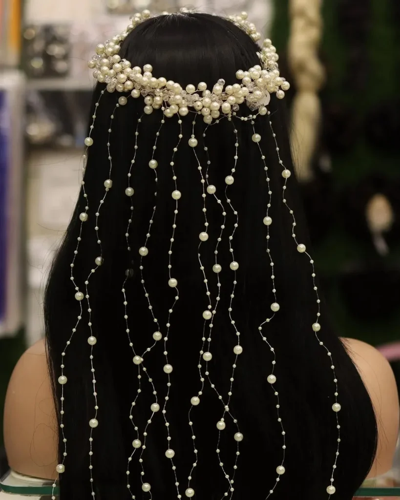 15 Wedding Hairstyles for Long Hair That Look Luxe, Romantic, and Totally Effortless 16 Long Hair with Pearl Accessories