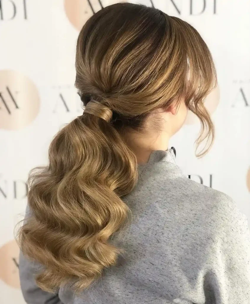 Low Ponytail With Face Framing Pieces