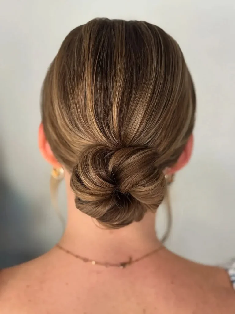 16 Easy Short Hair Updos That Look Fancy but Take Basically Zero Effort 3 Low Twisted Bun For Short Hair