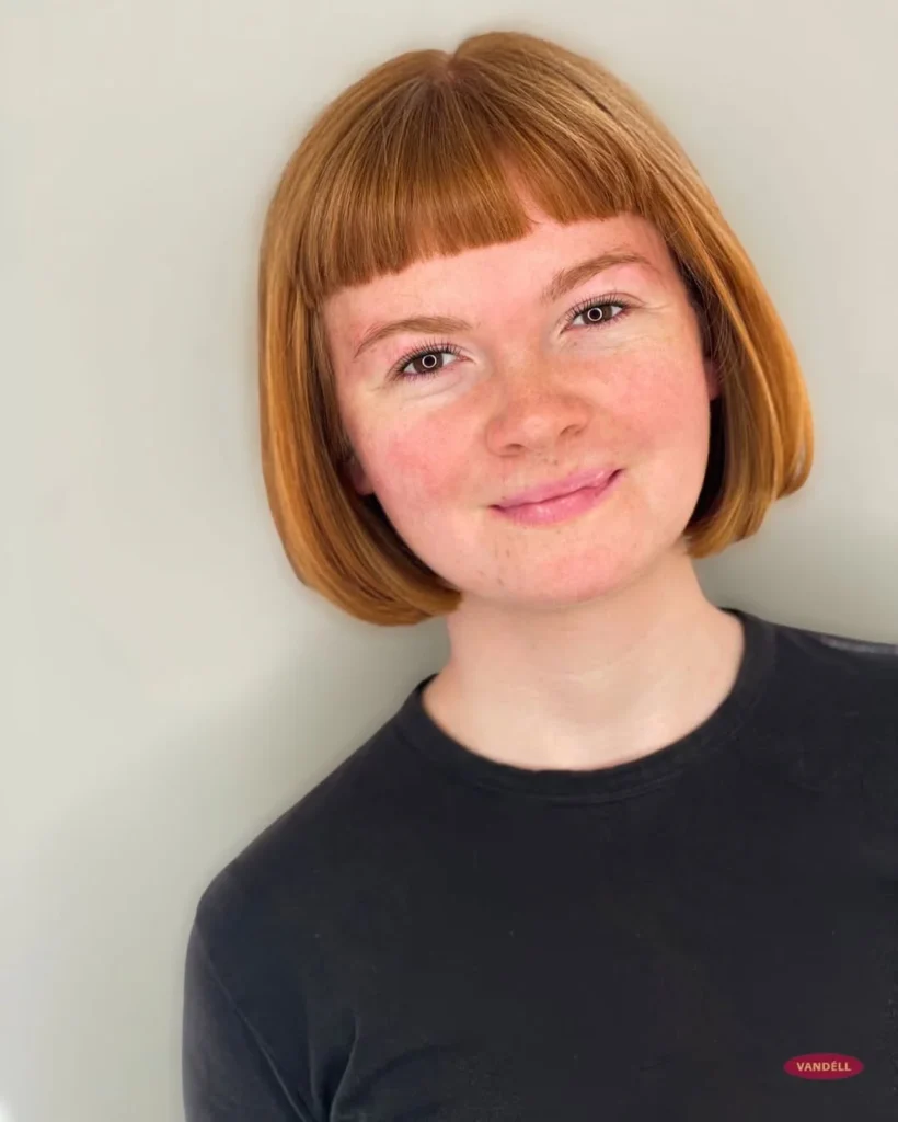 15 Hairstyles With Bangs That Instantly Make You Look Cooler 3 Sleek Bob With Blunt Bangs