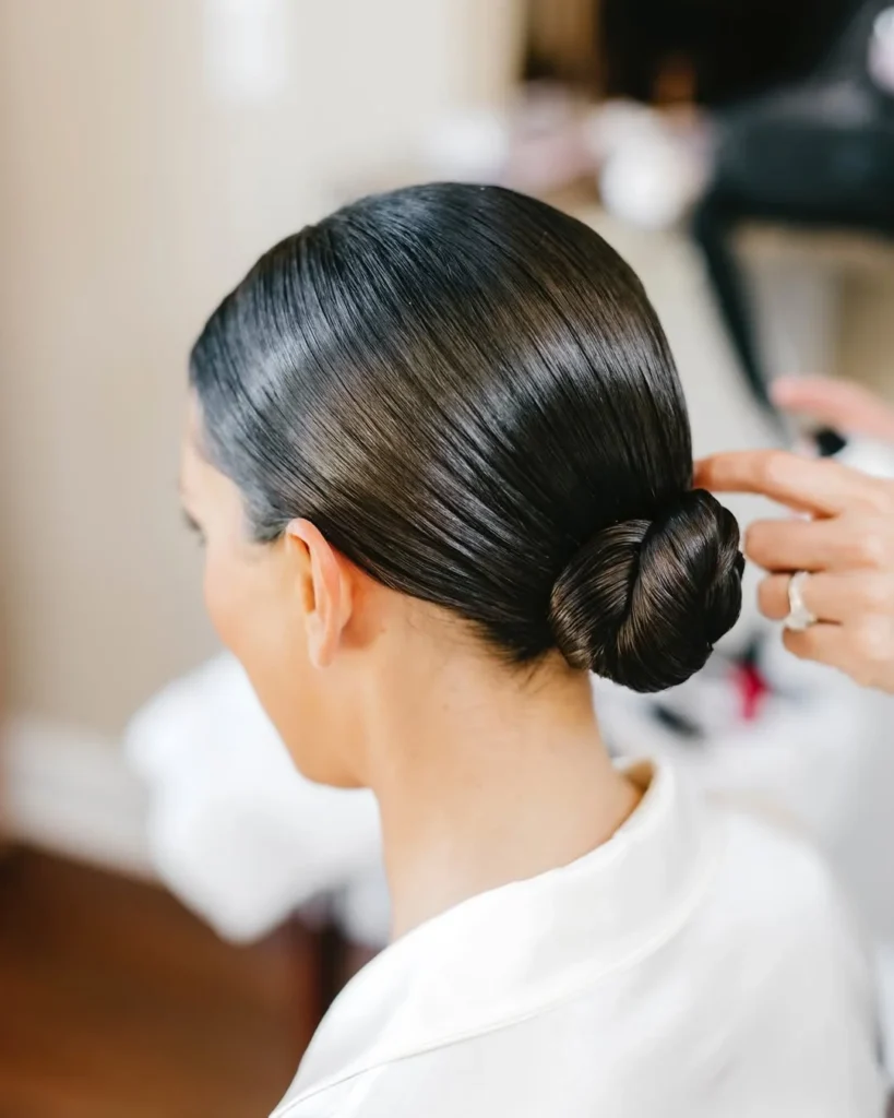 15 Concert Hairstyle Ideas That Look Cute, Last All Night, and Survive the Encore 6 Sleek Low Bun
