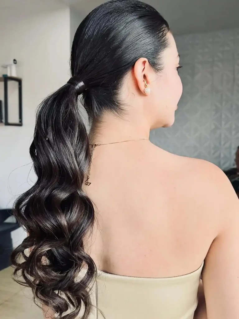 15 Wedding Hairstyles for Long Hair That Look Luxe, Romantic, and Totally Effortless 7 Sleek Low Ponytail 1
