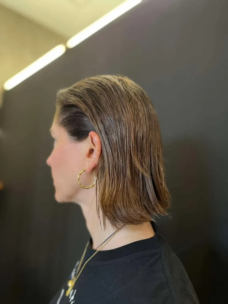 15 Concert Hairstyle Ideas That Look Cute, Last All Night, and Survive the Encore 11 Slicked Back Wet Look