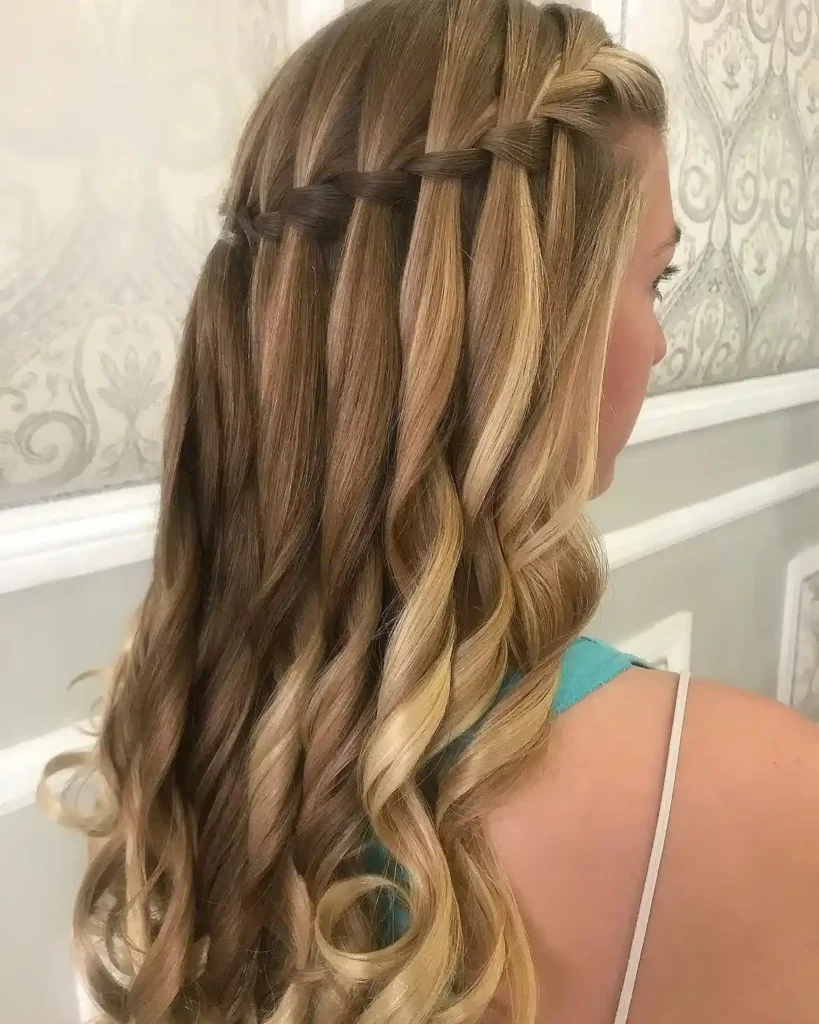 15 Wedding Hairstyles for Long Hair That Look Luxe, Romantic, and Totally Effortless 9 Waterfall Braid with Curls