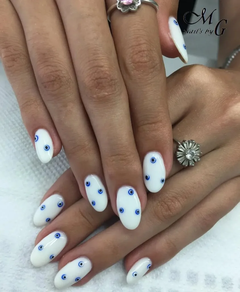 White Nails with Blue Abstract Lines