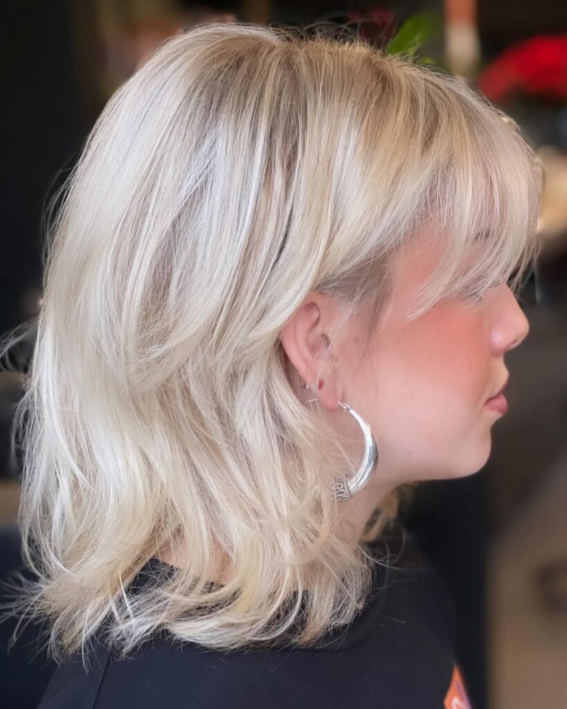15 Short Hair Wolf Cut Styles That Will Make You Want to Chop It All Off (Trust Me, It’s Worth It) 7 Wolf Cut with Blonde Highlights