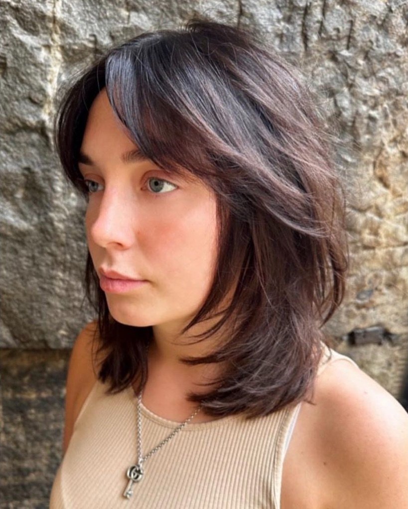 15 Short Hair Wolf Cut Styles That Will Make You Want to Chop It All Off (Trust Me, It’s Worth It) 3 Wolf Cut with Undercut Curly Vibes