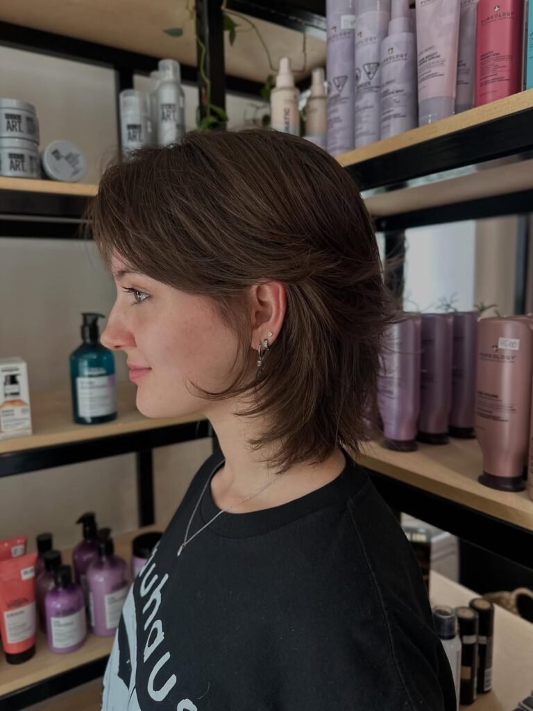 15 Short Hair Wolf Cut Styles That Will Make You Want to Chop It All Off (Trust Me, It’s Worth It) 14 Wolf Cut with a Slick Back Style