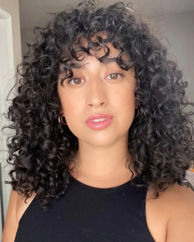 17 Short Thick Hair Ideas That Will Instantly Upgrade Your Look (No Effort, All Style) 4 Curly Shag Cut