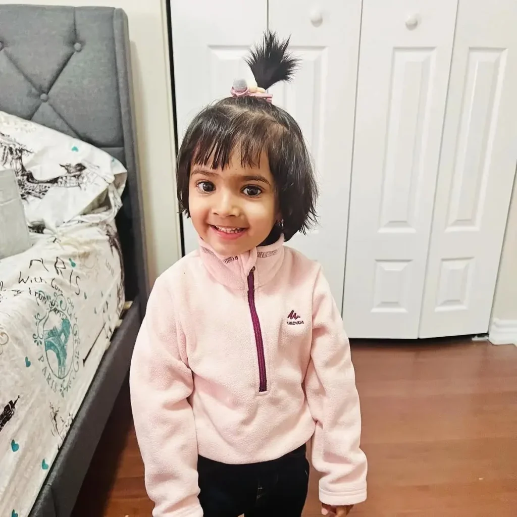 16 Baby Hairstyle Ideas That Are Too Cute to Handle — Easy, Sweet & Totally Photo-Ready 13 Low Baby Ponytail