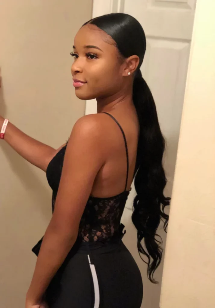 15 Elegant Hairstyle Ideas That Make You Look Expensive Without Trying Too Hard 6 Low Ponytail With a Middle Part
