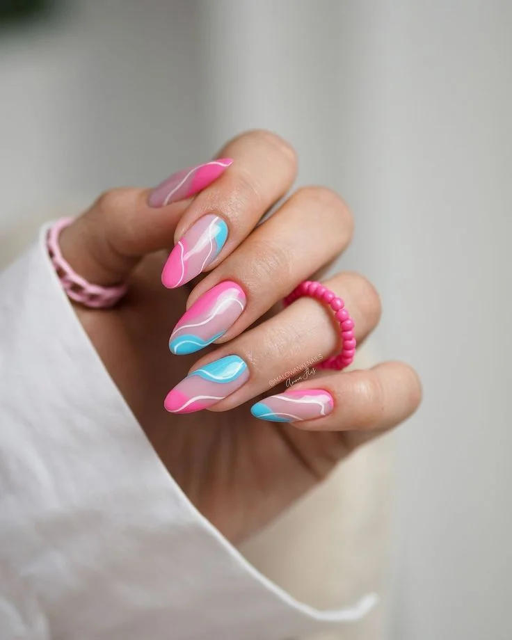17 Pink and Blue Nails That Are Giving Soft Girl, Barbiecore & Mermaid Energy 8 Pink and Blue Swirl Nails