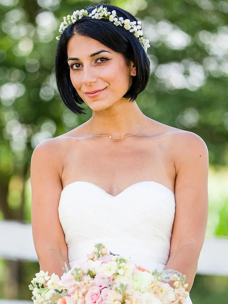 17 Short Hair Brides That Look Chic, Fresh, and Totally Wedding-Ready 11 Short Bob With Floral Crown