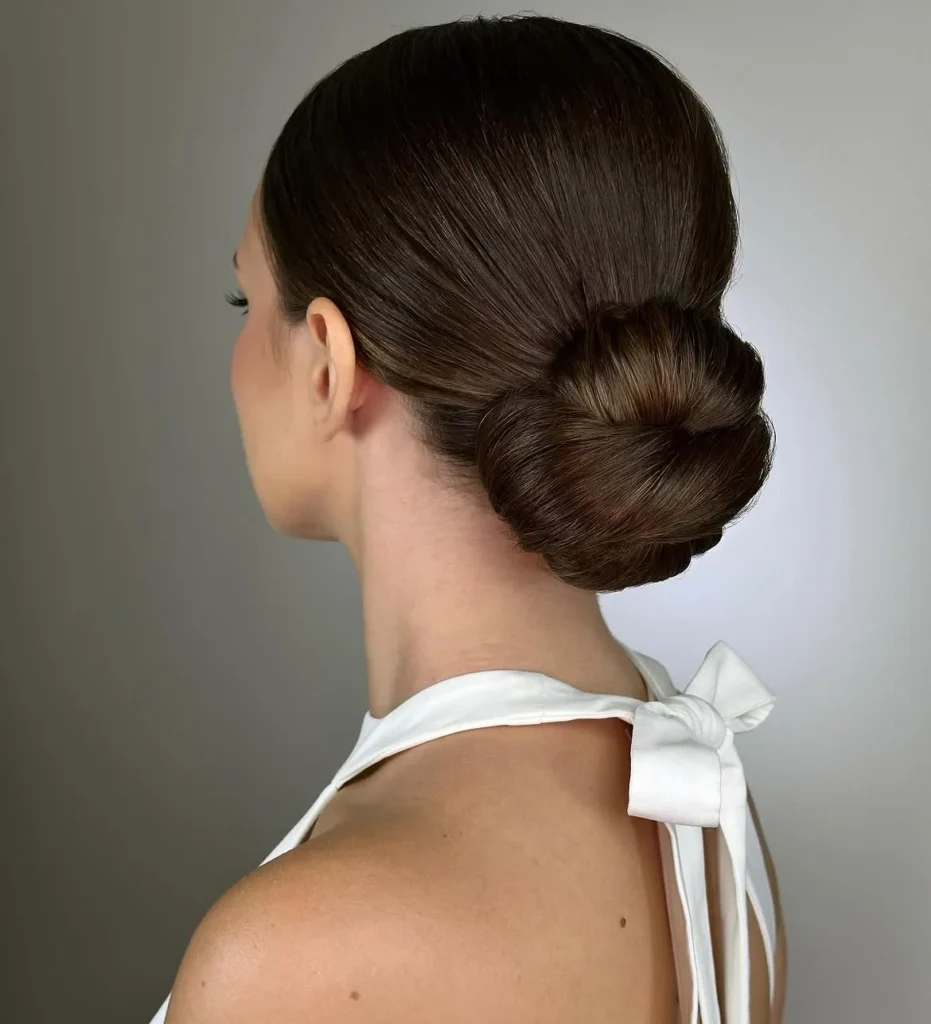 15 Elegant Hairstyle Ideas That Make You Look Expensive Without Trying Too Hard 2 Sleek Low Bun