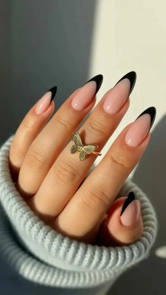 16 Classy Almond Nails That Make Every Outfit Look Expensive (Your New Everyday Nail Obsession) 7 Black Almond Nails With a Chic Finish