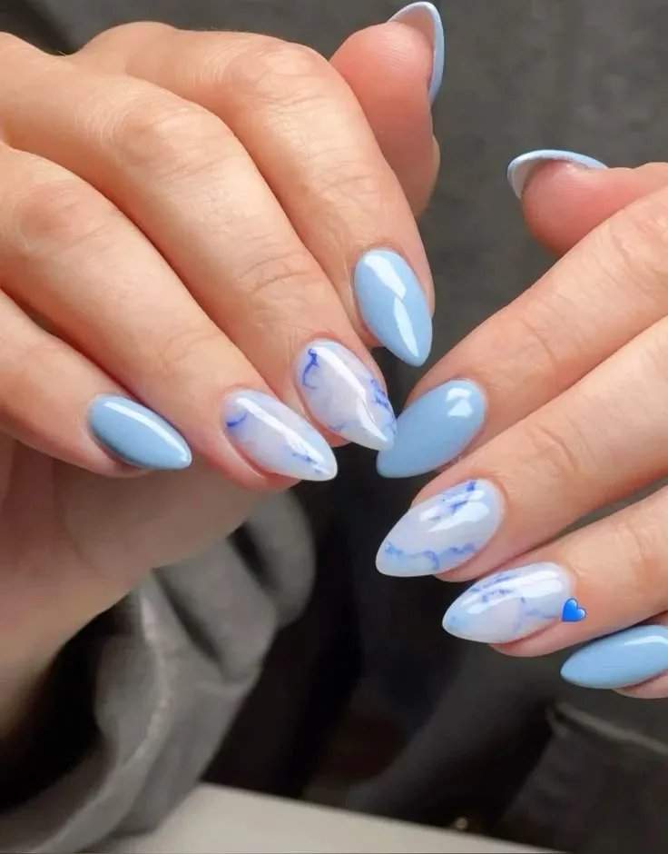 16 Blue Chrome Nails That Look Expensive, Cool, and Main Character Approved 15 Blue Chrome Marble Nails