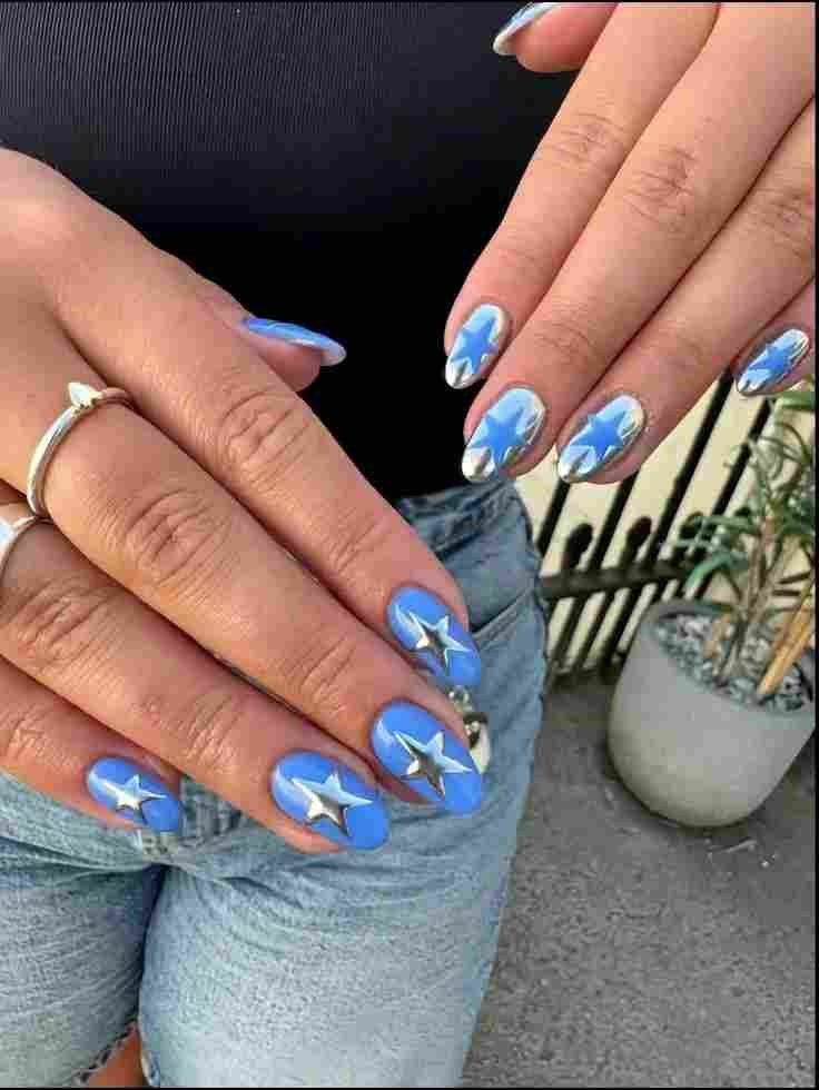 16 Blue Chrome Nails That Look Expensive, Cool, and Main Character Approved 16 Blue Chrome Nails With Stars