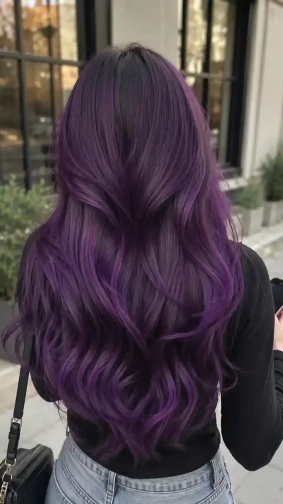 19 Purple Hair Color Ideas That Look Expensive, Cool, and Just a Little Bit Dangerous 3 Deep Plum Purple Hair