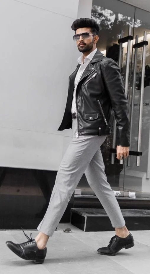 Cool Layers, Zero Fuss: 16 Fall Outfits Men Can Actually Wear 13 Leather Jacket With Grey Trousers