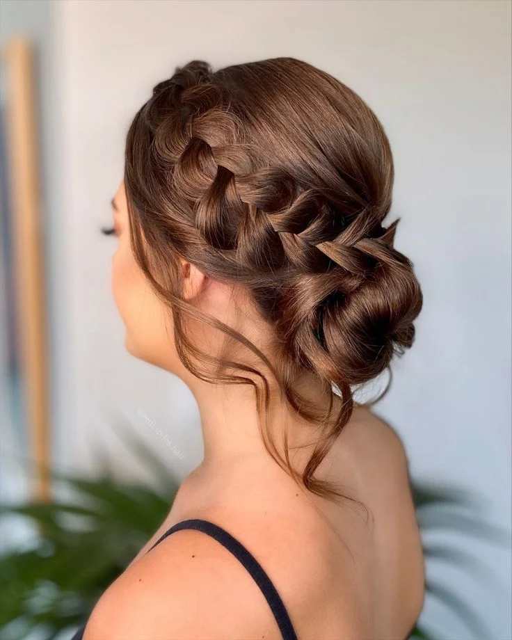 17 Low Bun Hairstyles That Look Effortlessly Chic Without Trying Too Hard 15 Low Bun With Braided Front Pieces