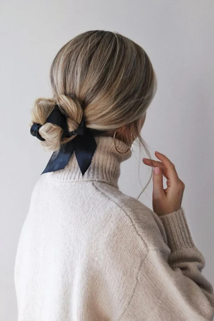 17 Low Bun Hairstyles That Look Effortlessly Chic Without Trying Too Hard 13 Low Bun With a Ribbon