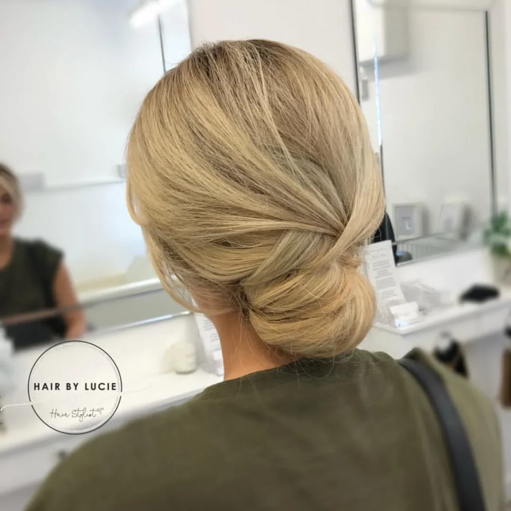 16 Formal Hairstyles That Make You Look Expensive With Basically Zero Drama 5 Low Textured Chignon