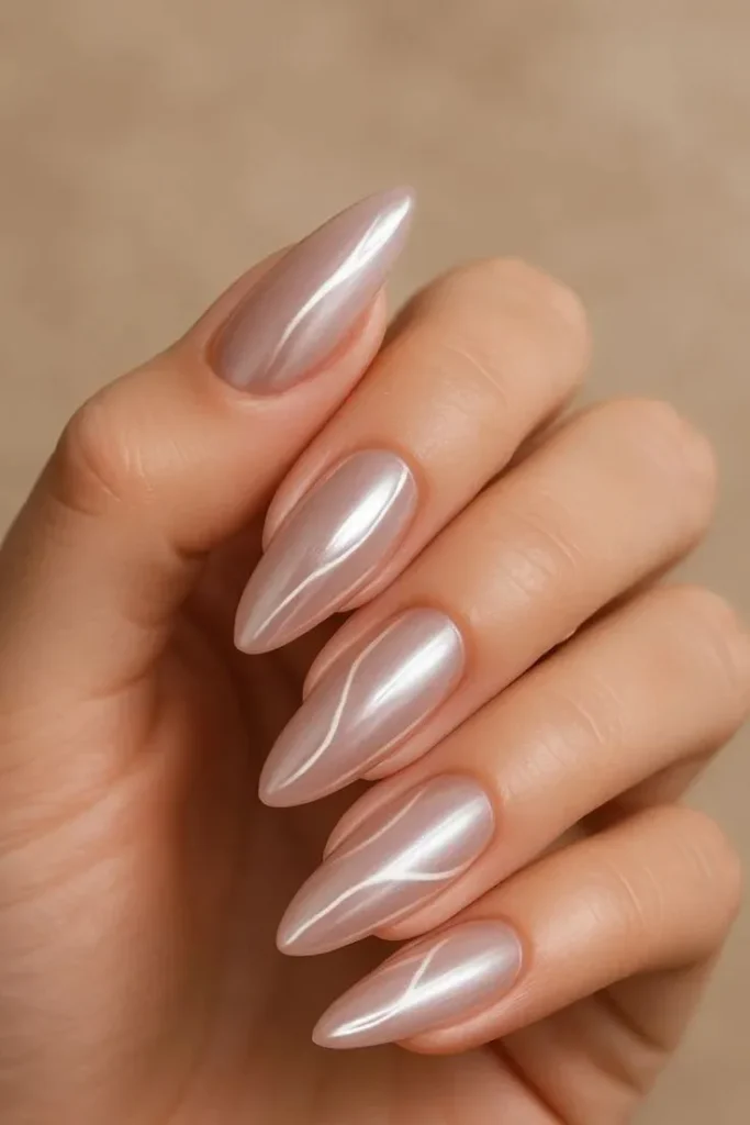 Nude Almond Nails With Chrome Effect