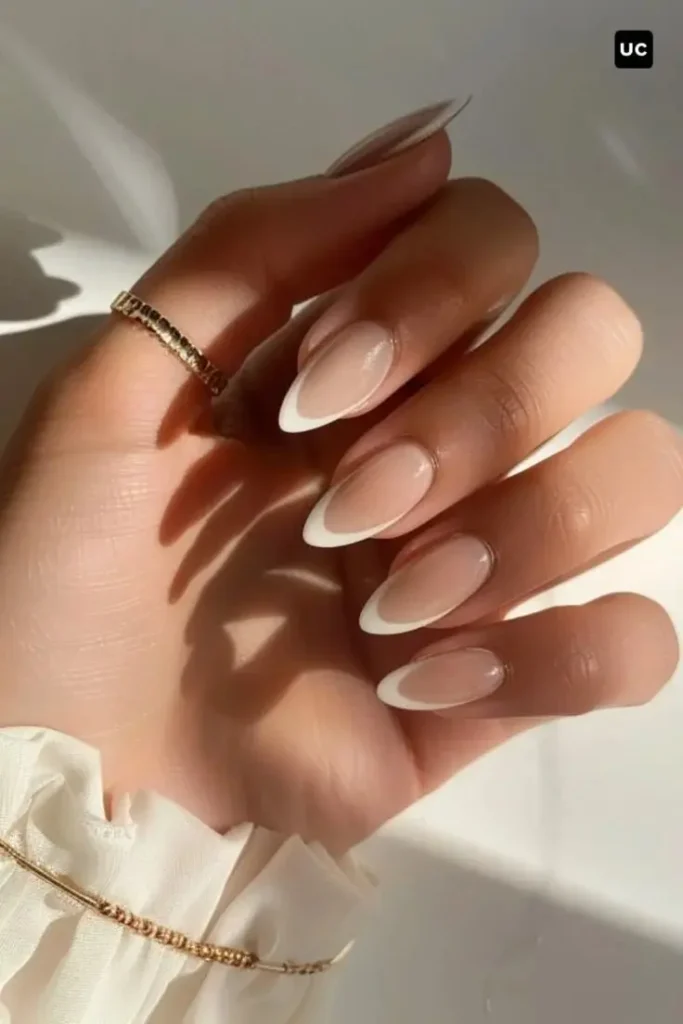 Nude Almond Nails With Classic French Twist