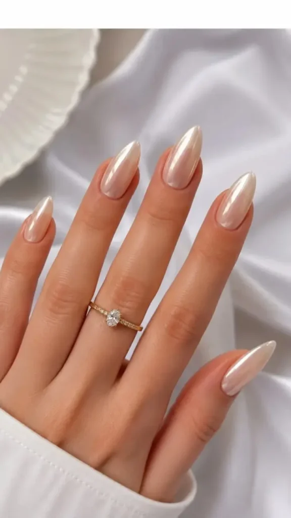 Nude Almond Nails With Pearl Finish