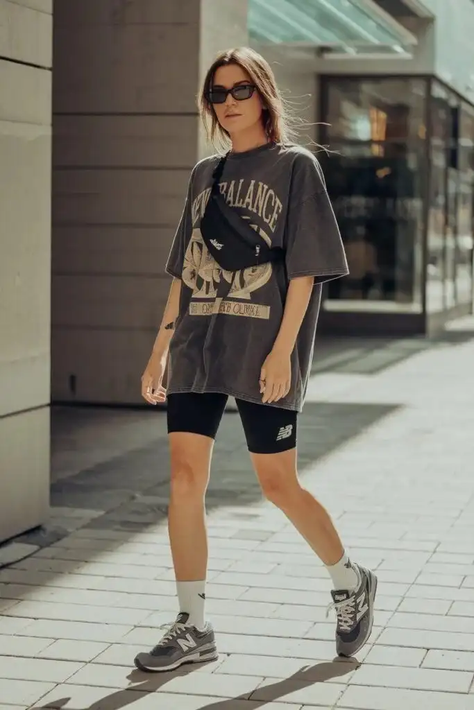 19 Festival Outfit Ideas That Look Cool, Feel Comfy, and Survive the Whole Weekend 3 Oversized Band Tee Biker Shorts