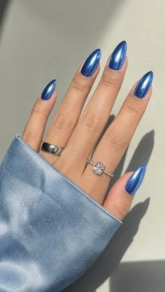 16 Blue Chrome Nails That Look Expensive, Cool, and Main Character Approved 3 Royal Blue Chrome Almond Nails