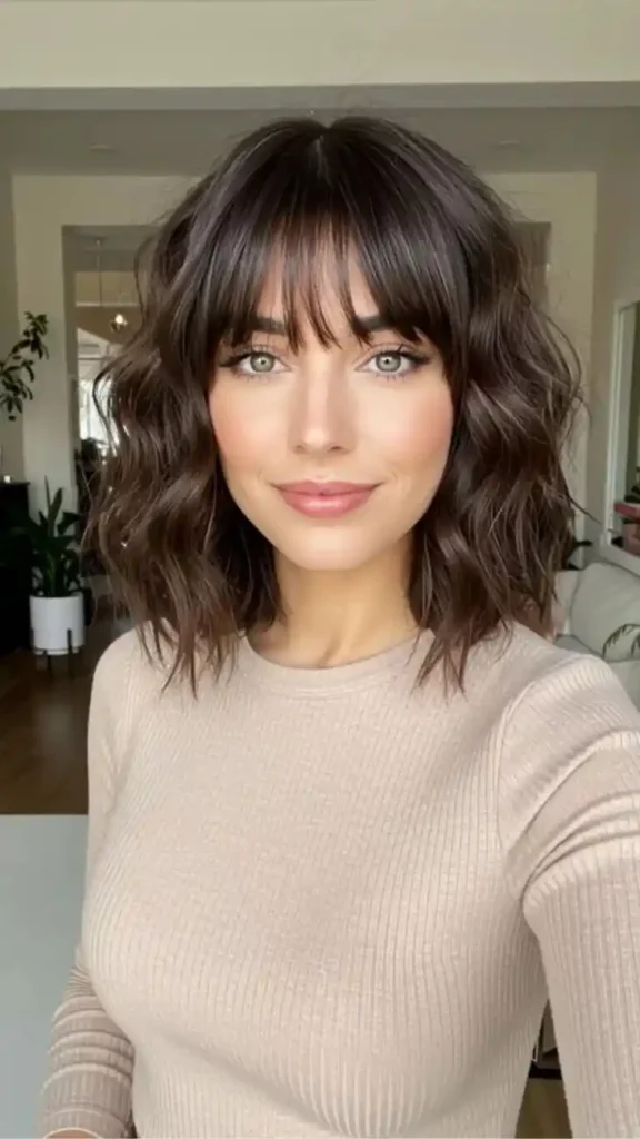 18 Short Dark Hair Ideas That Look Expensive, Chic, and Way Too Easy to Pull Off 11 Short Dark Hair With Wispy Bangs
