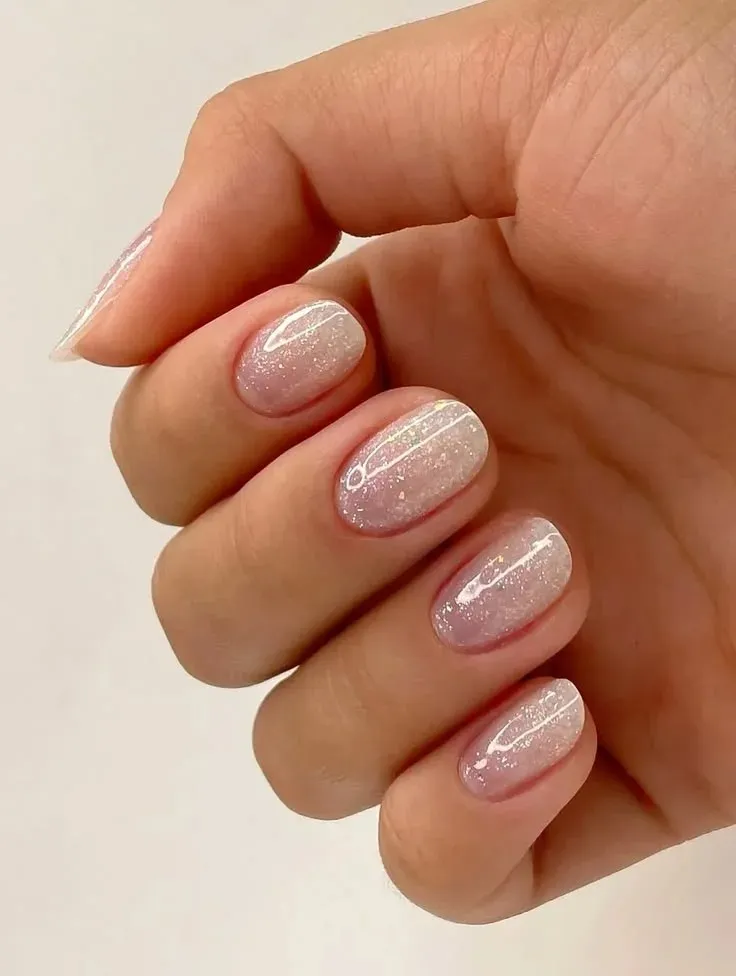 16 Simple Short Nails Ideas That Look Chic Without Trying Too Hard 7 Short Nails with One Glitter Accent