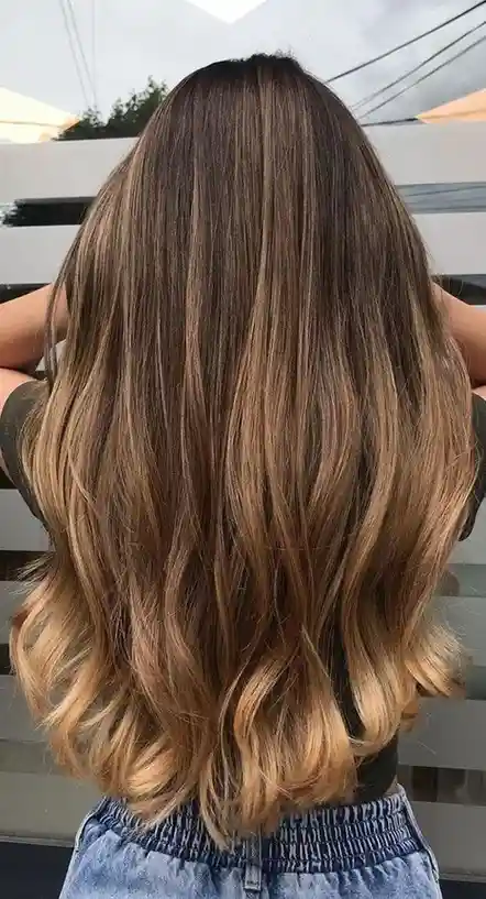17 Spring Hair Color Ideas That Look Fresh, Expensive, and So Ready for Sunny Days 12 Sun Kissed Balayage