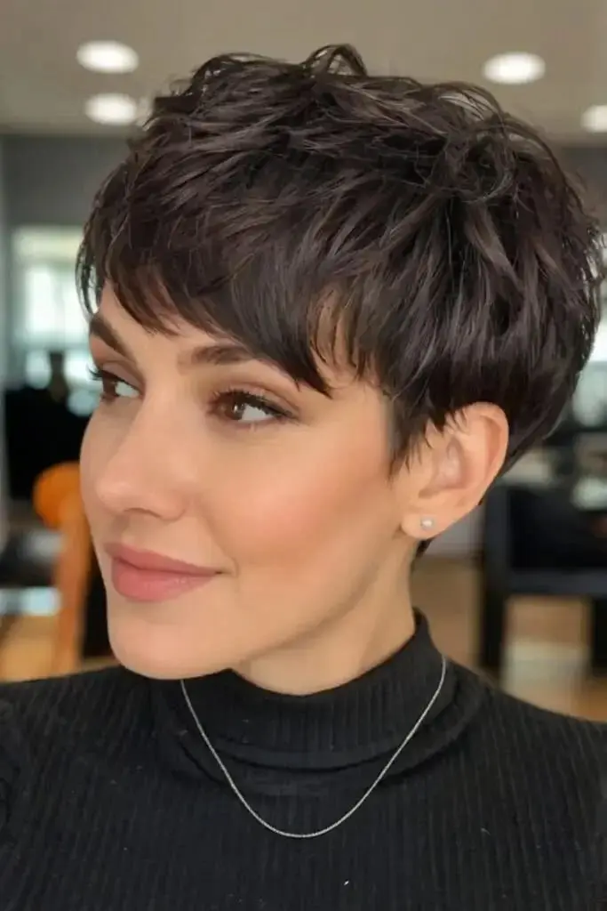 18 Short Dark Hair Ideas That Look Expensive, Chic, and Way Too Easy to Pull Off 3 Textured Dark Pixie Cut